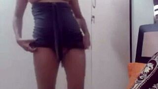 Big boobs playfully dance in black night