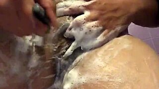 in this video, we see the process of shaving a hairy bush on a young woman