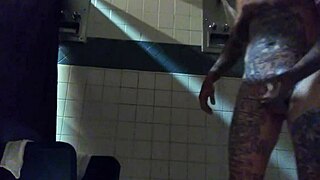 Stroking big tattd up white dick in shower.