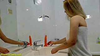 Anal sex with a big dildo in the bathroom