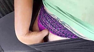 Feeling horny, this young girl plays with her feet and pussy.