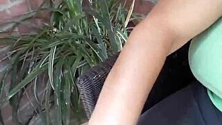 Feeling horny, this young girl plays with her feet and pussy.