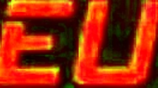 During the Brazil game, a beautiful brunette with tattoos shares an intimate moment.