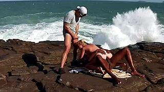 Busty blonde tourist gets anal fucked by locals in interracial outdoor threesome with double penetration.