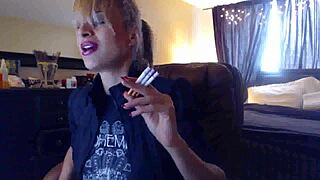 sandi smokes three brown cork cigarettes