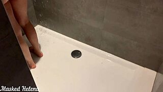 Skinny amateur wife masturbates in the shower while watched