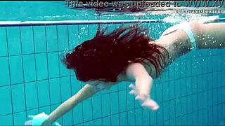 Is Nata swimming underwater with her tight pussy?