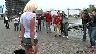 Busty Blonde Flashes Big Tits in Wet Public Display