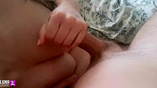 Early morning handjob leads to cum on big tits in homemade video