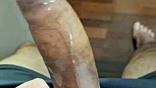 guy struggles with condom on thick penis