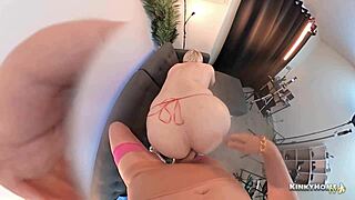 Girl dominates locked guy with massive strapon