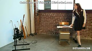 Boldly punishing a misbehaving redhead student with intense whipping, spanking, and fingering.