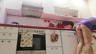 I spy on my stepmom in the kitchen, teasing with her skirt up.