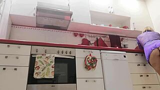 I spy on my stepmom in the kitchen, teasing with her skirt up.