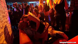 blonde party chick gets banged hard in wild club gangbang