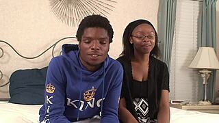 Ebony chick sucks boyfriend's cock hard