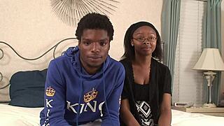 Ebony chick sucks boyfriend's cock hard