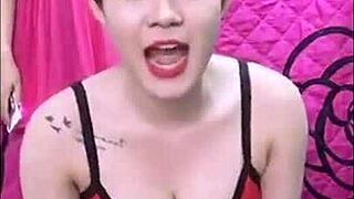 A hot Vietnamese girl performs a live stream, showcasing her beauty and culture in an engaging online session.