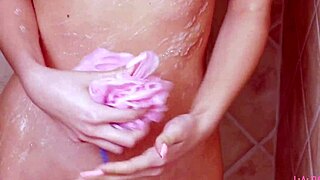 brunette beauty captivates in steamy shower scene, curious?