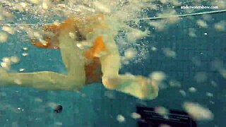 nastya strips bikini and shows tight nude body in pool shower.