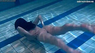 ivetta splashing around in the pool for fun