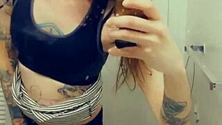 In a miniskirt, the trans woman shows her cock proudly