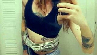 In a miniskirt, the trans woman shows her cock proudly