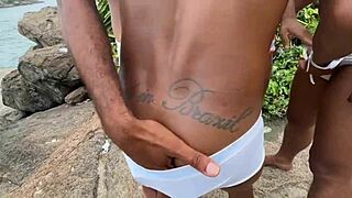 Hot gay orgy on the beach with big black cock and bareback action