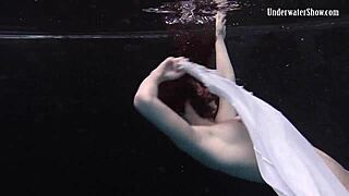 Andrejka performs astonishing underwater moves in bikini pool