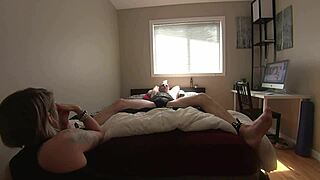 milf playfully teases her tied boyfriend's sensitive feet