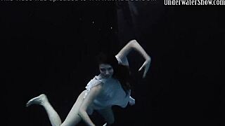 Andrejka performs astonishing underwater moves in bikini pool