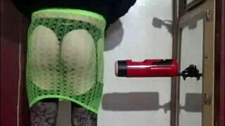 Crossdresser enjoys machine masturbation shyly