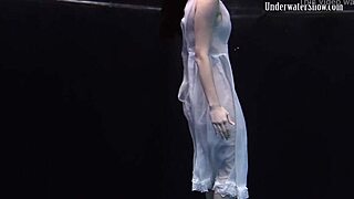 Andrejka performs astonishing underwater moves in bikini pool