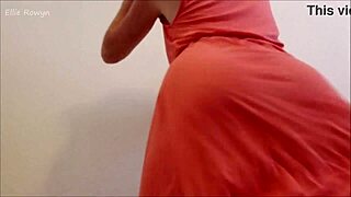 Peek up Ellie Rowyn's skirt as she shakes her redhead ass. Her striptease reveals a kinky buttplug!