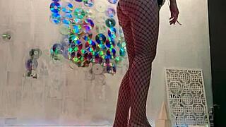 Passionate beauty masturbates to orgasm after Christmas photoshoot