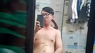 Vietnamese gay top sucks big cock in condom, craving monster dick?