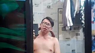 Vietnamese gay top sucks big cock in condom, craving monster dick?