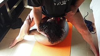 Ebony milf's yoga interrupted by lover eating pussy. He finishes with cum on her face.