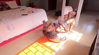 Ebony milf's yoga interrupted by lover eating pussy. He finishes with cum on her face.