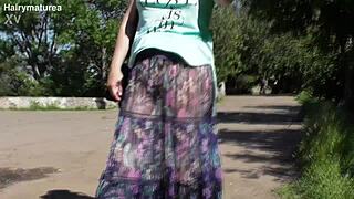 hairy mature flaunts curves in transparent dress on display