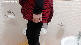 Solo goddess relaxes on the toilet in sexy lingerie