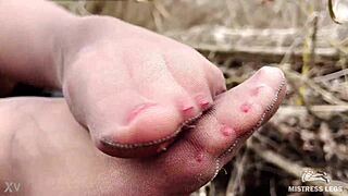 goddess teases with tan pantyhose feet in spring forest