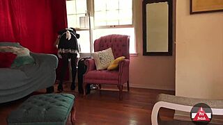 French maid cleaning house in sexy cosplay outfit.