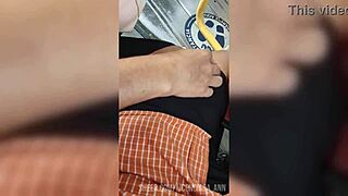 Mature woman with a big ass walks the street in tight leggings