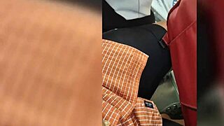 Mature woman with a big ass walks the street in tight leggings