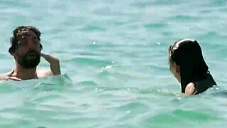 The actress Bibi from the Mexican movie Regina plays the role of a village boyfriend and swims in the sea