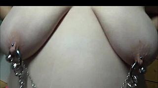 Double Pierced Wife Wearing Chains And Barbells In Bondage