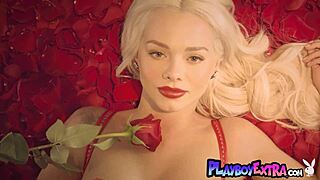 Petite blonde teen Elsa Jean strips naked among red petals for a stunning show