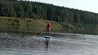 Skinny babe flashes pink micro bikini outdoors
