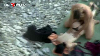 Beach Voyeur Catches Teen Flashing Panties in Doggy Style